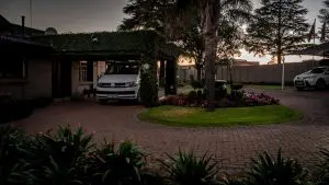 Diamond Rose Guest House - Peaceful Garden at Sunrise